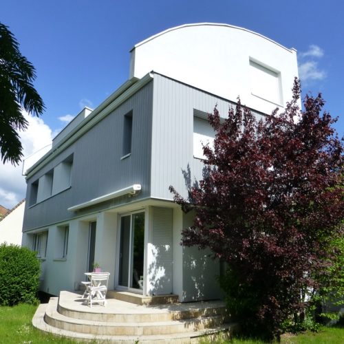 Après rénovation et extension d'une maison ancienne parisienne par TB Home Architecteurs